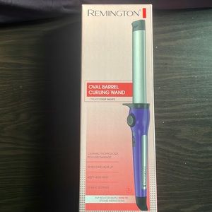 Oval barrel curling wand